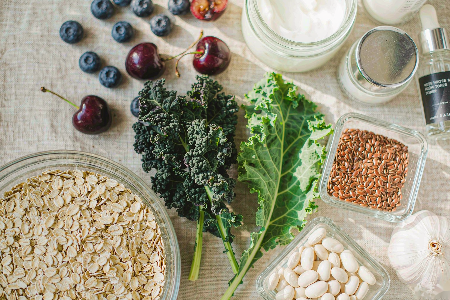 Flat lay of colorful fiber-rich whole plant foods for skin health
